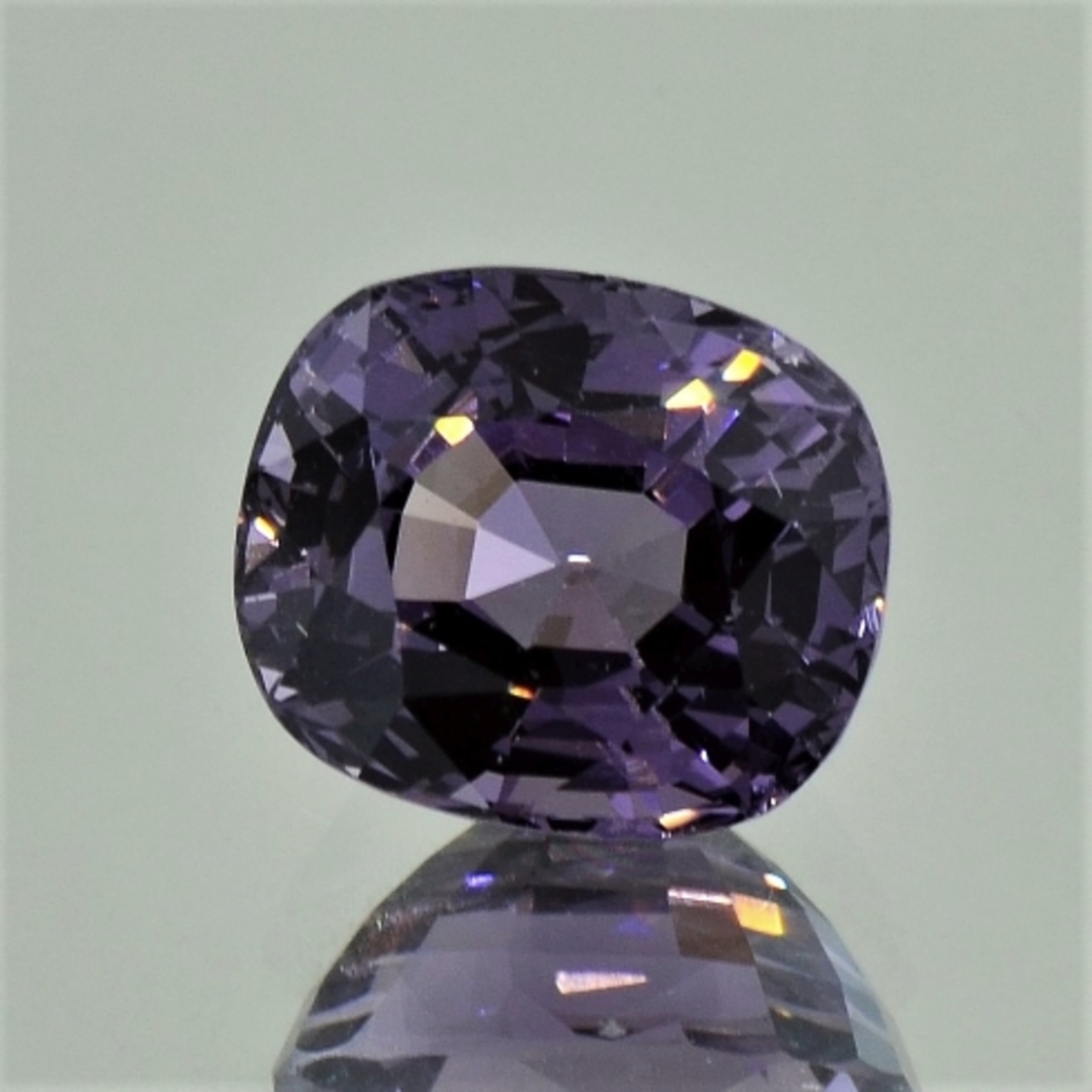 Spinel cushion grayish violet 5.40 ct