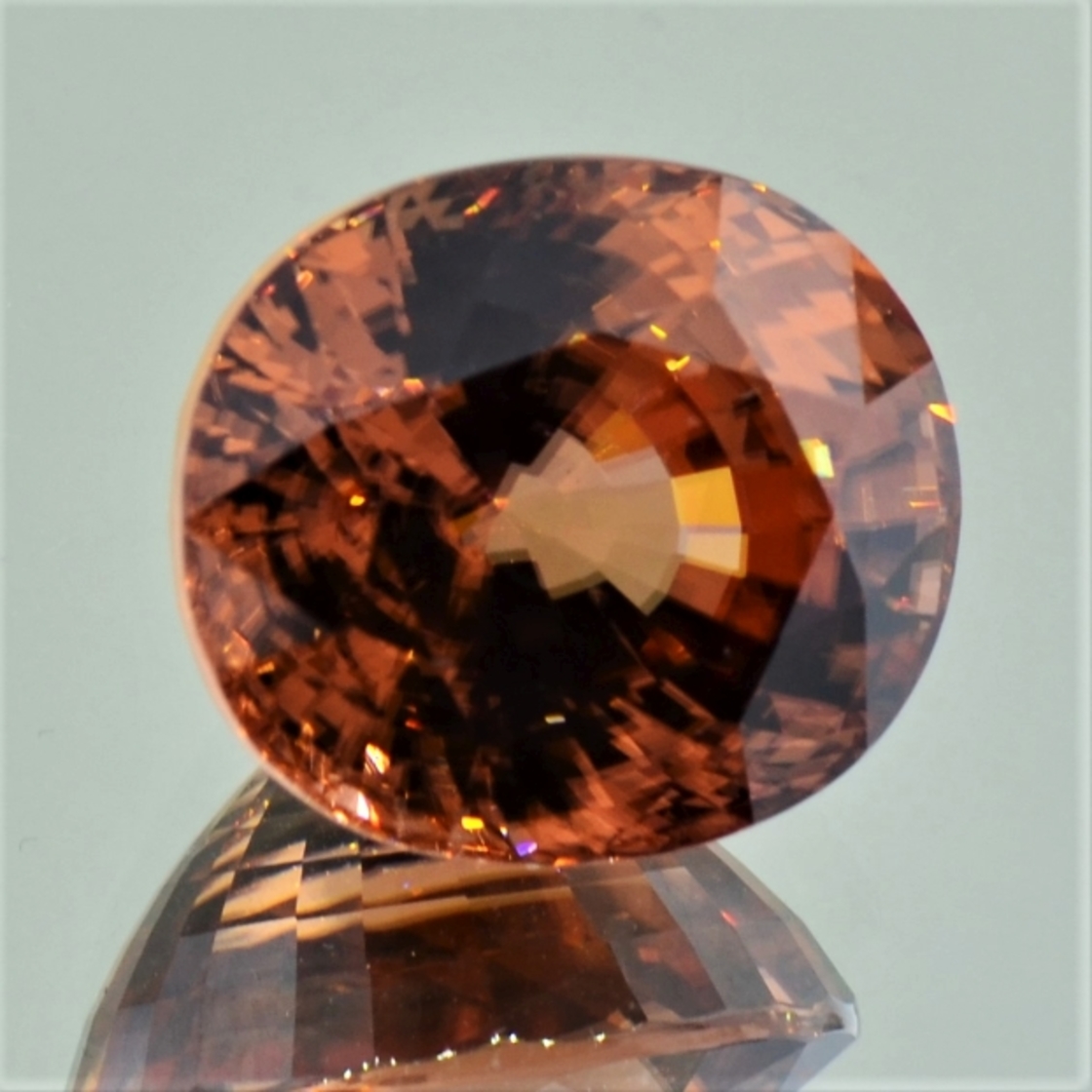 Zircon oval orange brown 21.23 ct