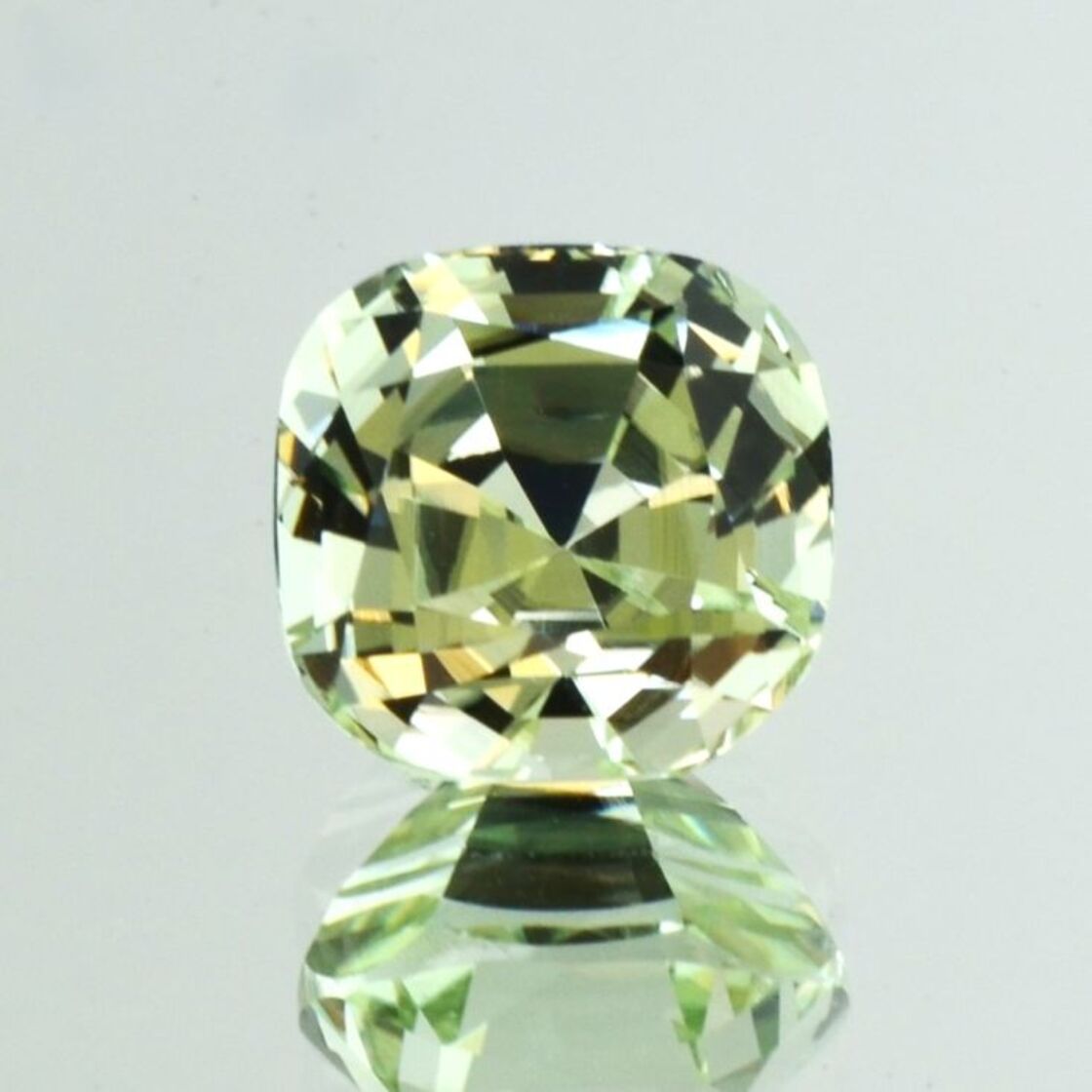 Tourmaline cushion light yellow green 10.69 ct.