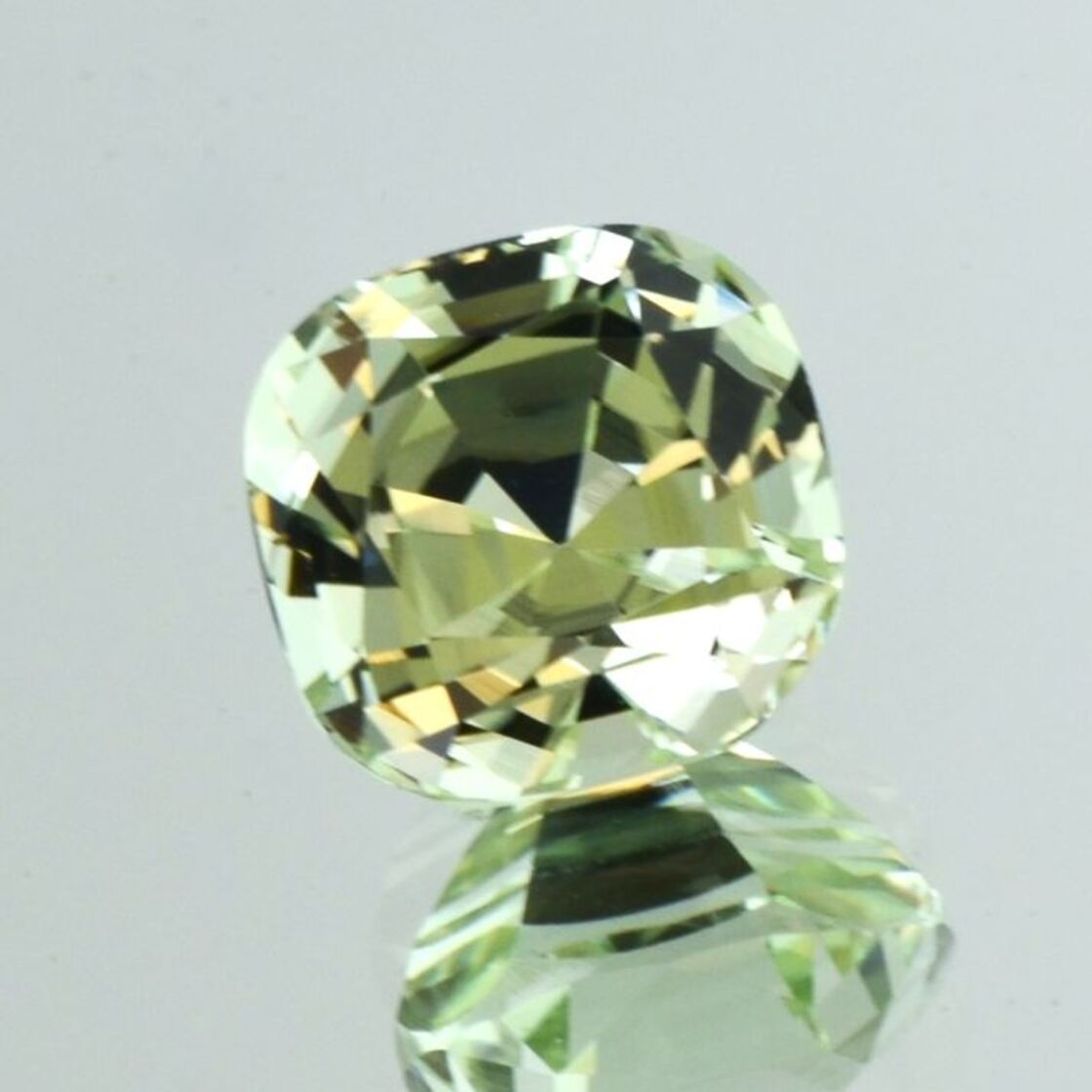 Tourmaline cushion light yellow green 10.69 ct.