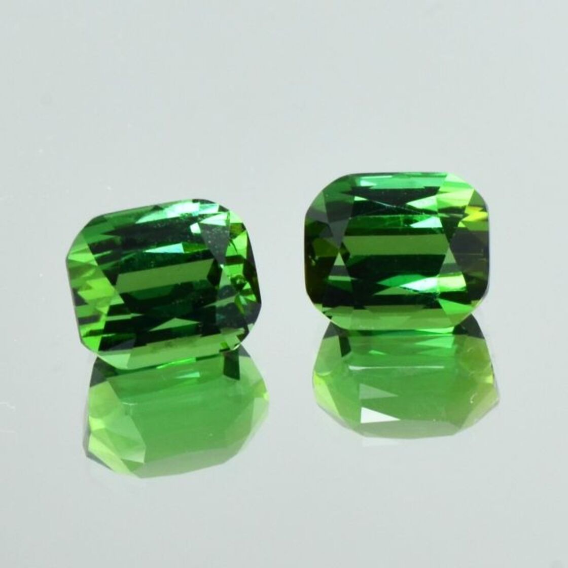 Green Tourmaline Pair Tourmalines cushion green 7.39 ct.