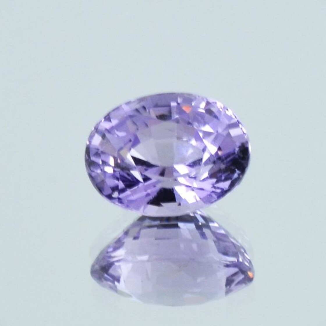 Spinel oval grayish lilac untreated 3.11 ct