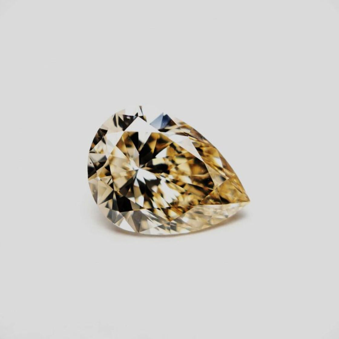 fancy diamond pear champagne  0.16 ct