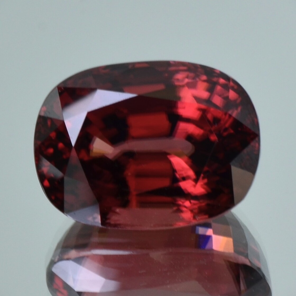 Zircon cushion reddish untreated 40.240 ct