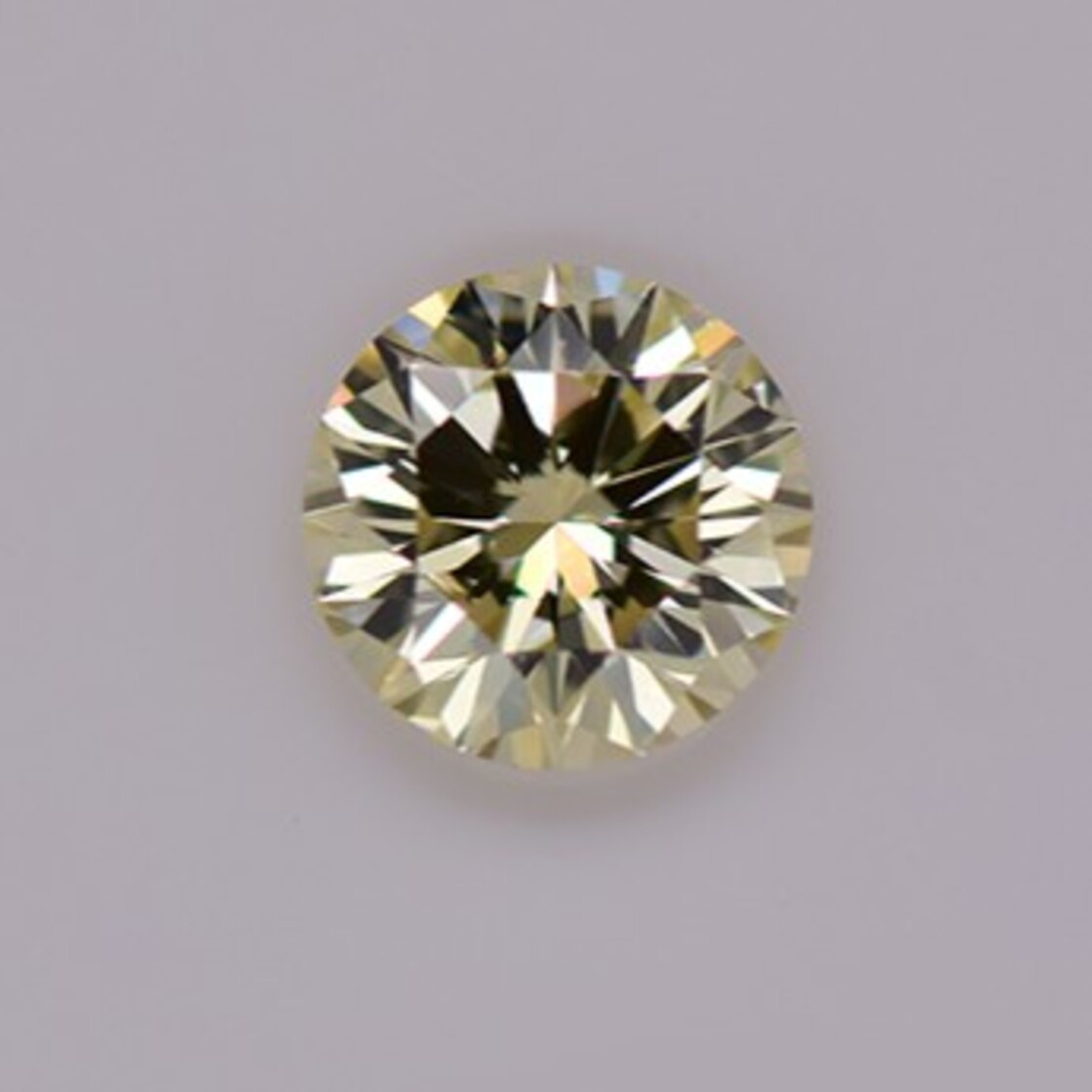 fancy diamond round brilliant champagne  si1 0.21 ct.
