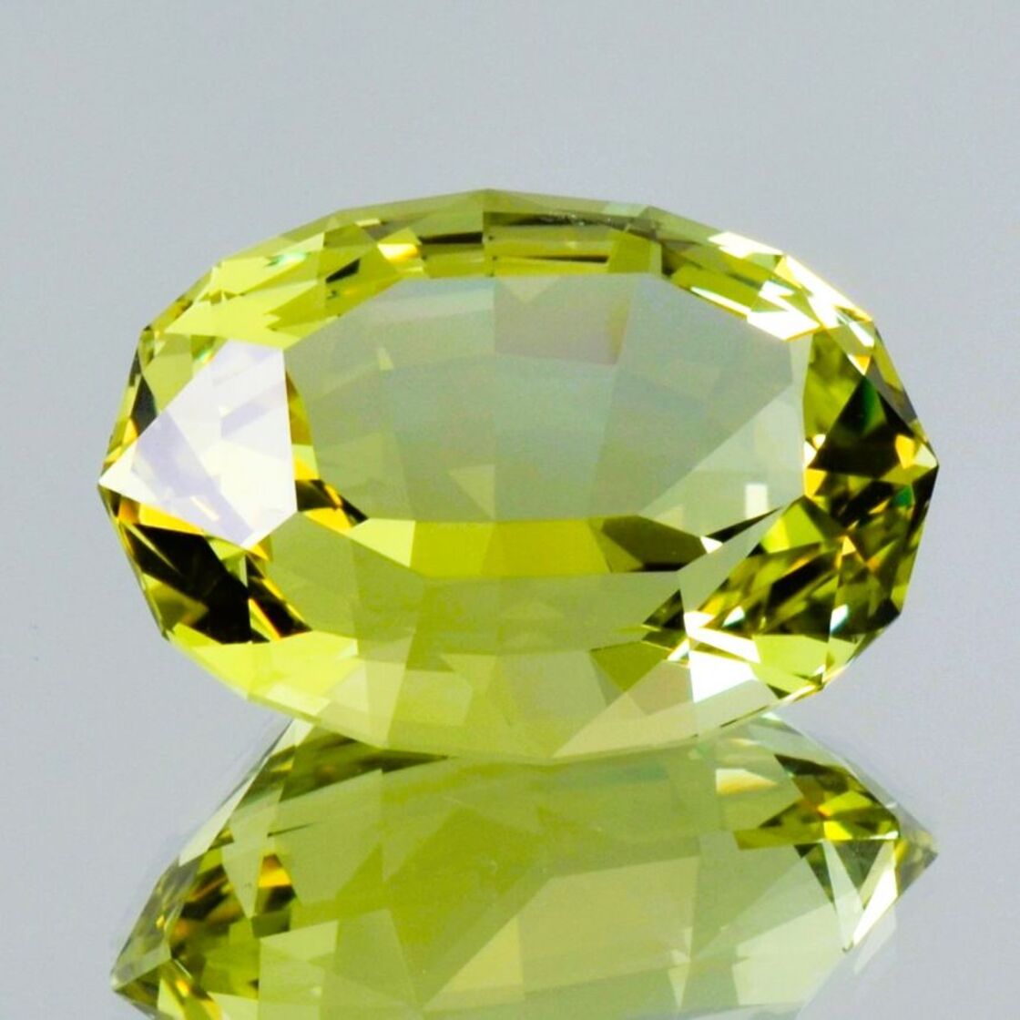Heliodor Beryl oval greenish yellow untreated 55.88 ct.