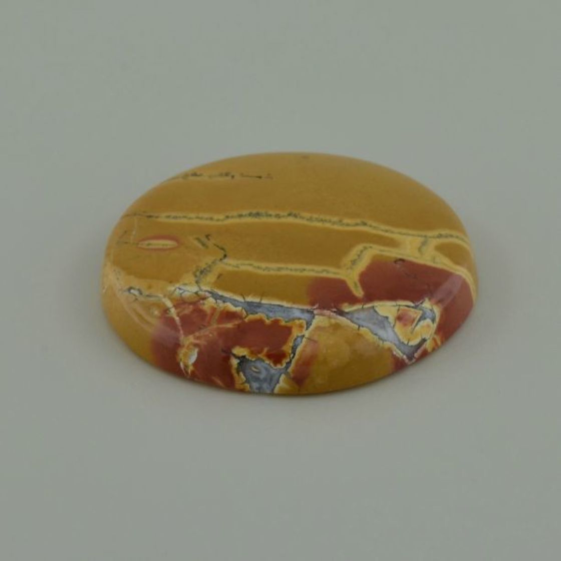 Jaspis Cabochon rund 65,63 ct