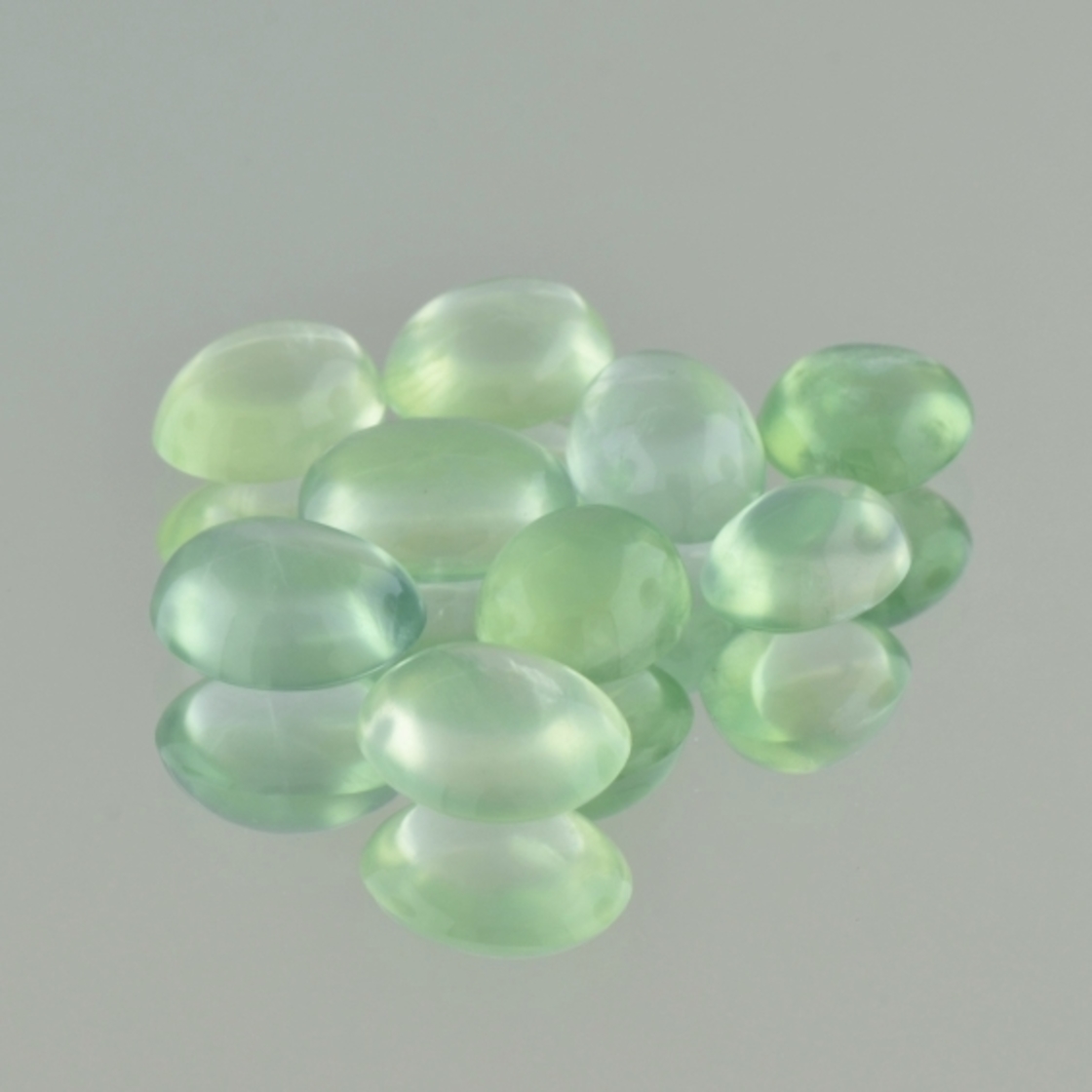 Prehnite Lot Cabochons oval light green 28.06 ct