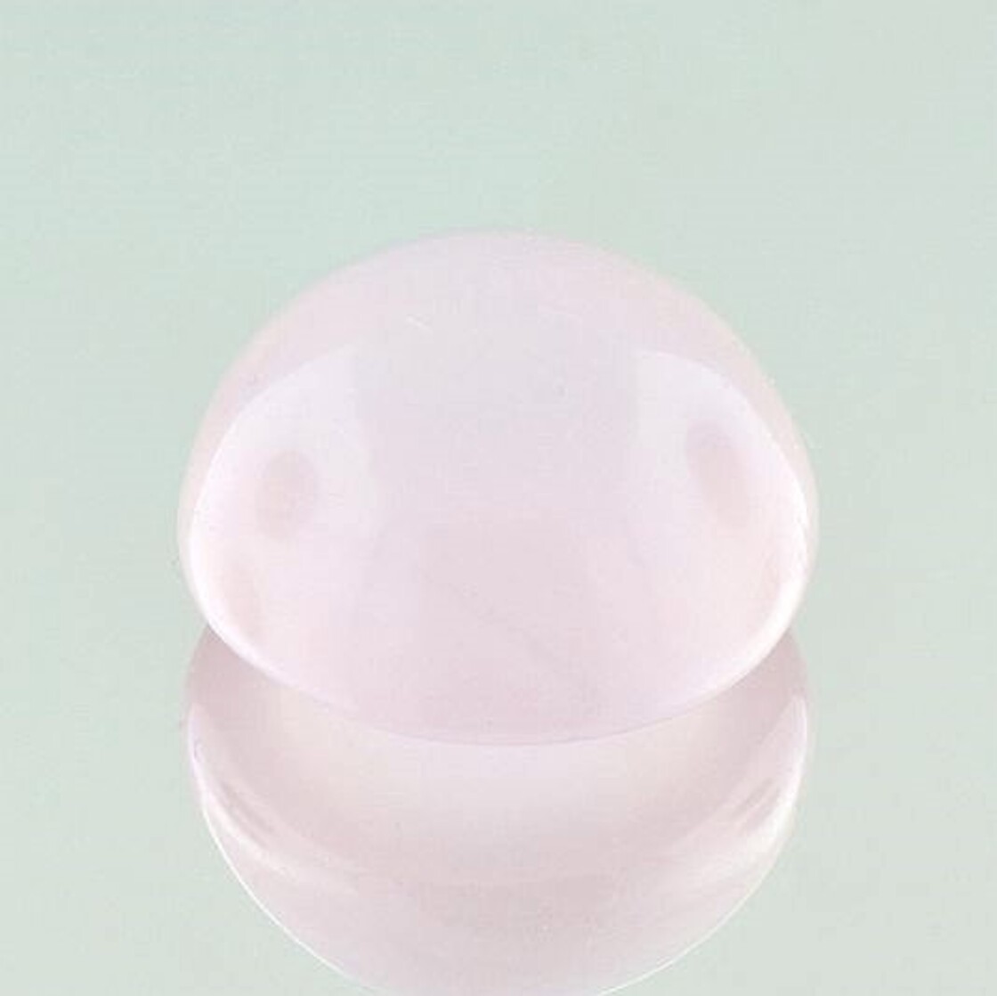 Rosenquarz Cabochon rund hellrosa 45,47 ct