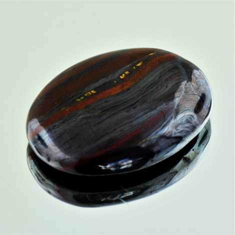 Tigereisen Cabochon oval 61,95 ct Tigereisen Cabochon oval 61,95 ct
