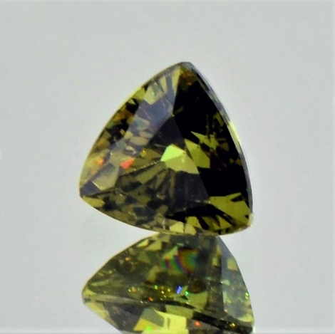 Demantoid trillion olive-green 1.29 ct Demantoid trillion olive-green 1.29 ct