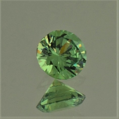 Demantoid Granat rund-brillantiert grün 0,65 ct