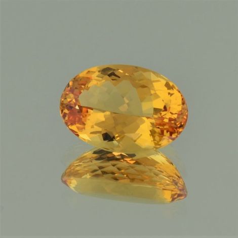 Imperial-Topas oval yellow orange untreated 6.99 ct.