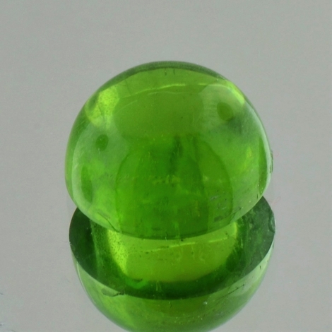 Peridot Cabochon rund 10,45 ct Peridot Cabochon rund 10,45 ct