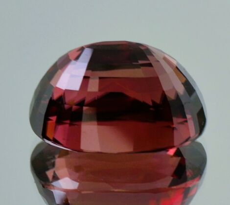 Zircon cushion reddish untreated 40.240 ct