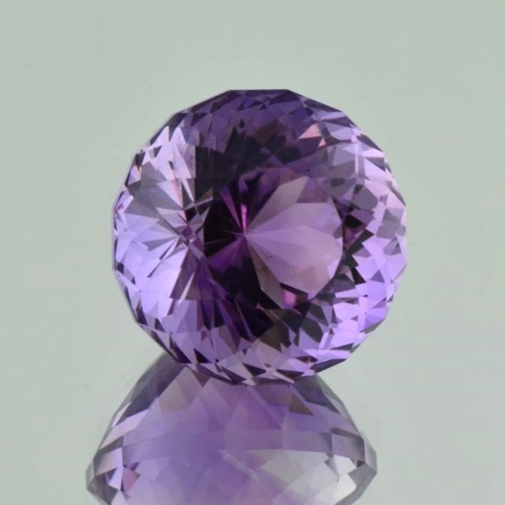 Amethyst round fantasy intense lilac 30.94 ct.