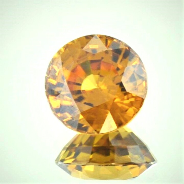 Zircon round brownish yellow 13.95 ct.