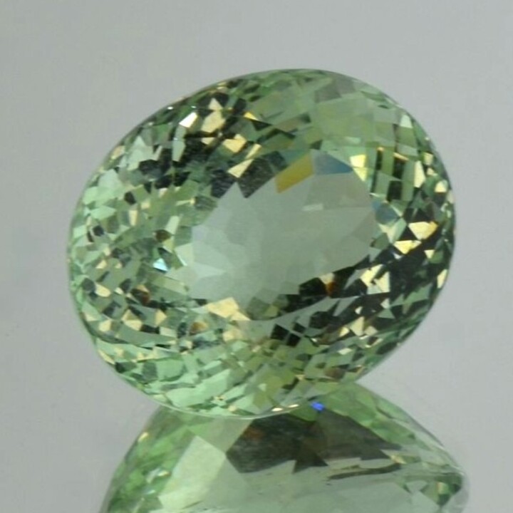 Beryl oval light green untreated 64.22 ct.