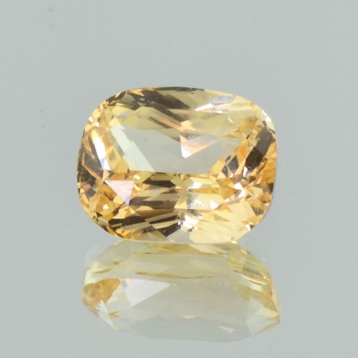 Sapphire cushion light orange yellow untreated 7.59 ct.