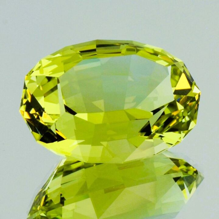 Heliodor Beryl oval greenish yellow untreated 55.88 ct.