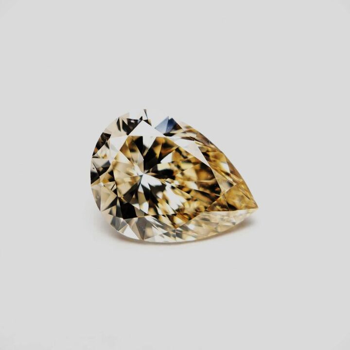 fancy diamond pear champagne  0.16 ct