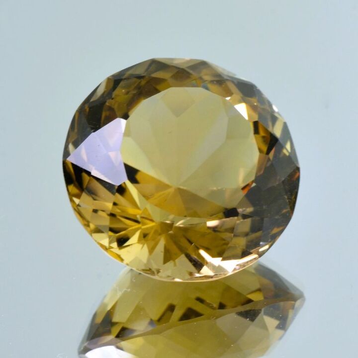 Citrine round yellowish 63.42 ct