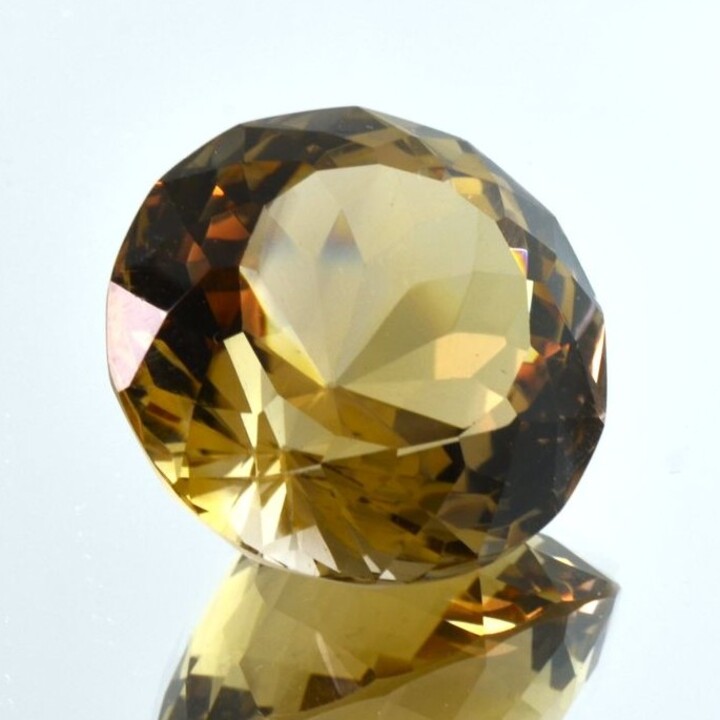 Citrine round yellowish 63.42 ct