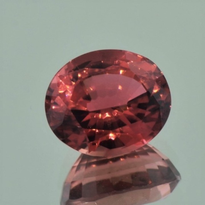 Tourmaline oval pinkish orange unheated 9.24 ct