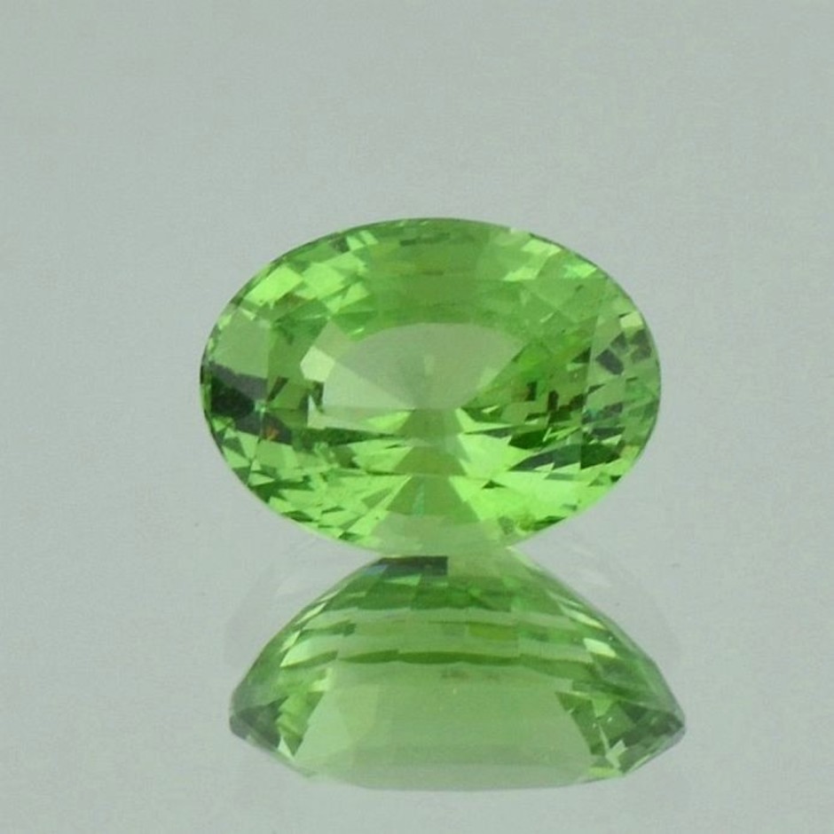 Grossularite Garnet oval yellowish green 6.26 ct